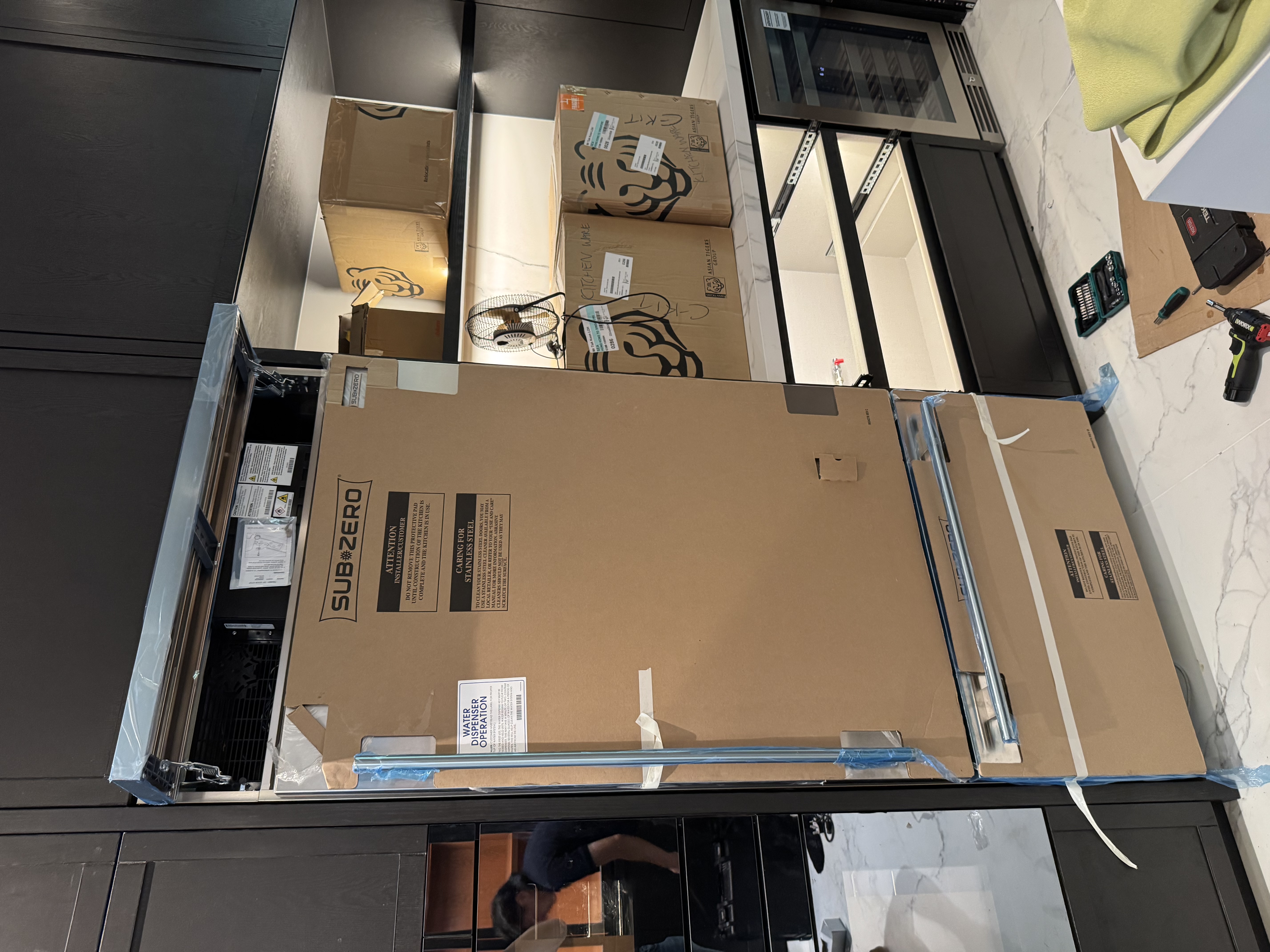 Sub-Zero fridge with side panel installation